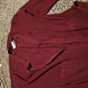 Maurices. New with tag. Women's size 0X. Maroon cardigan. Has pockets